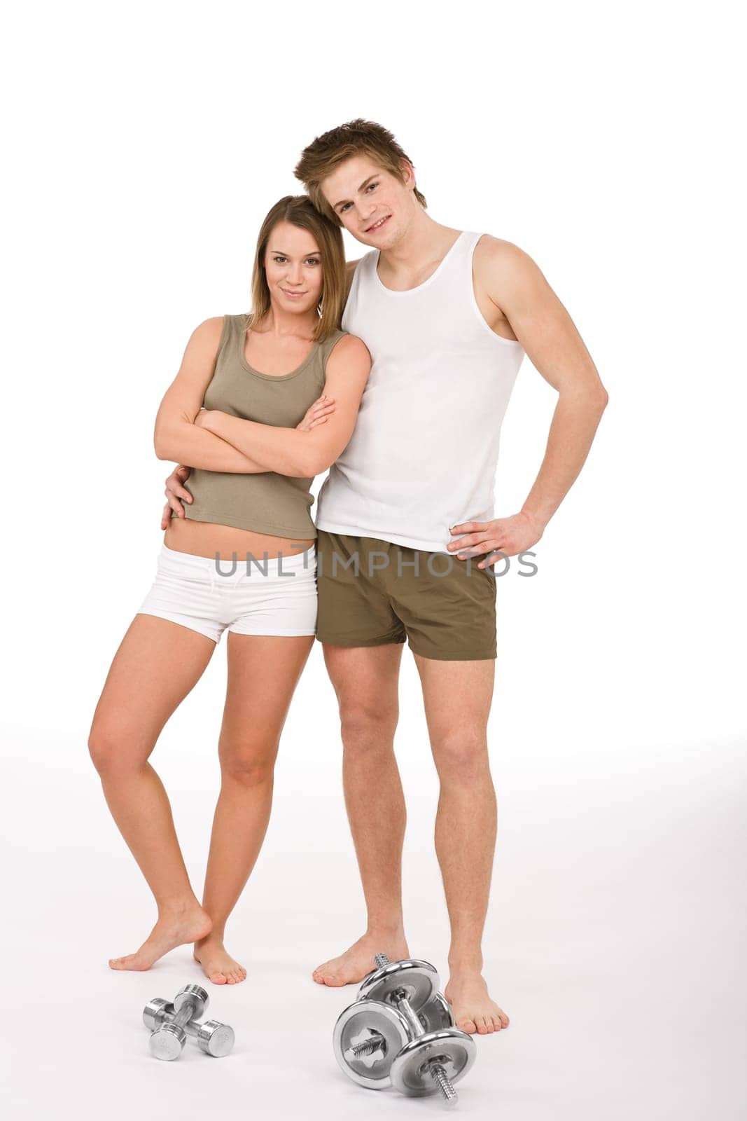 Fitness - happy couple with weights
