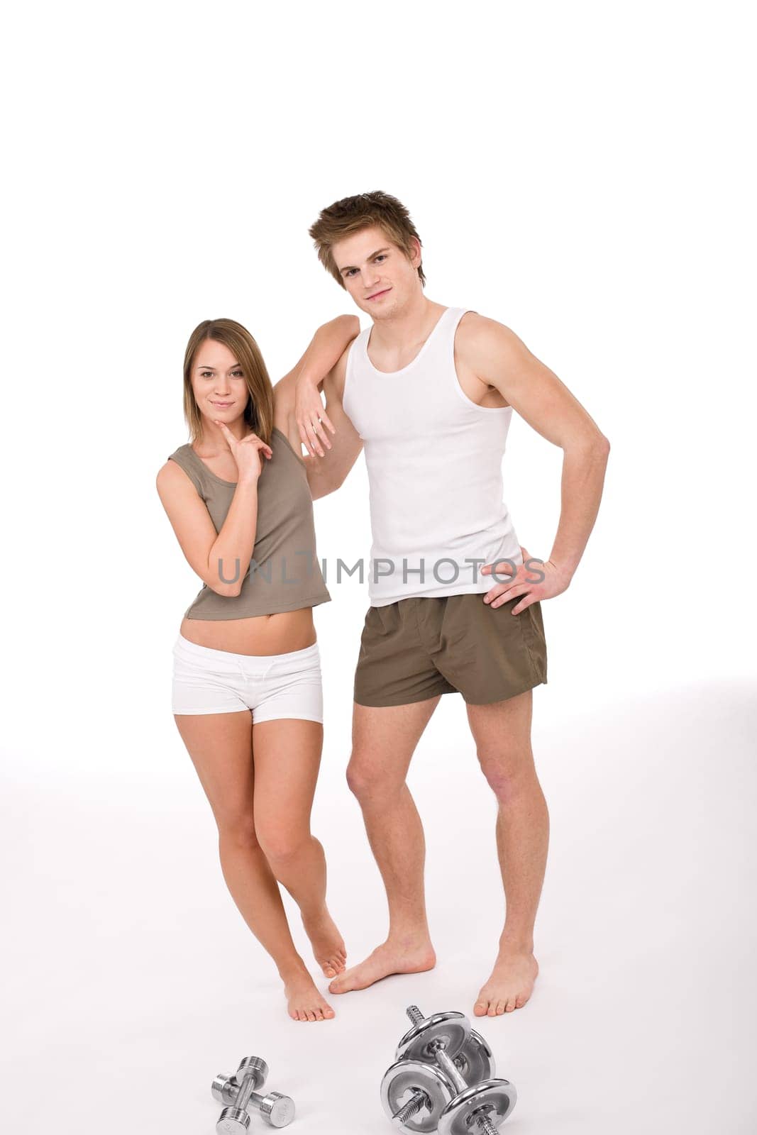 Fitness - happy couple with weights