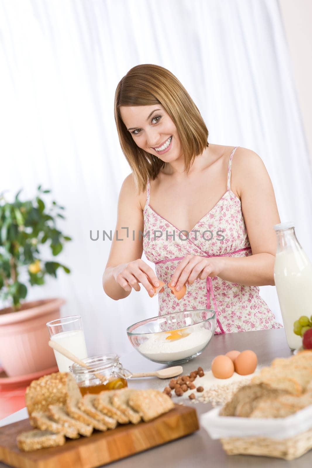 Baking -  woman with healthy ingredient