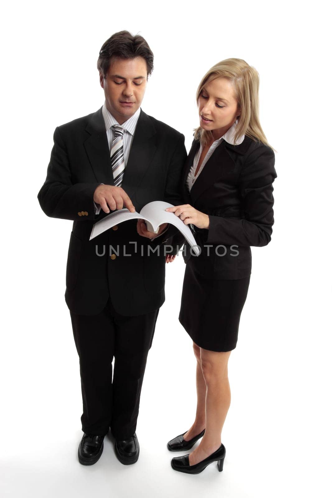 Business people reading contract or report
