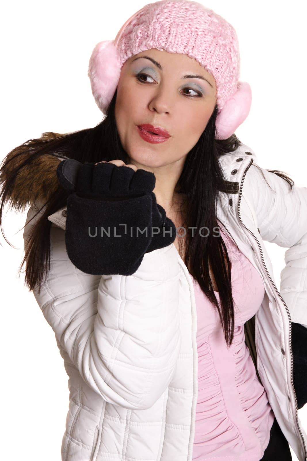 Winter woman blowing a kiss