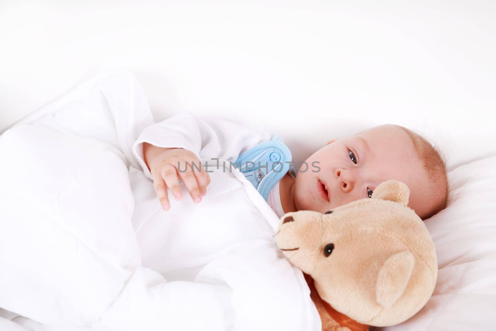 Adorable newborn in bed