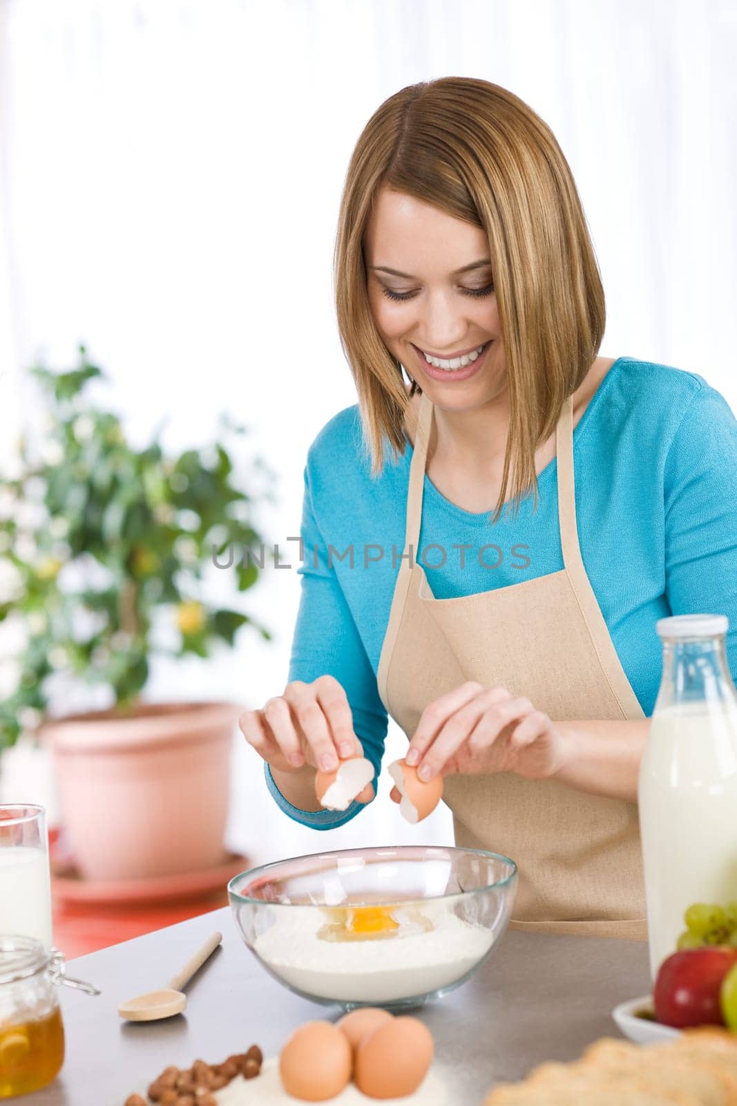 Baking -  woman with healthy ingredient