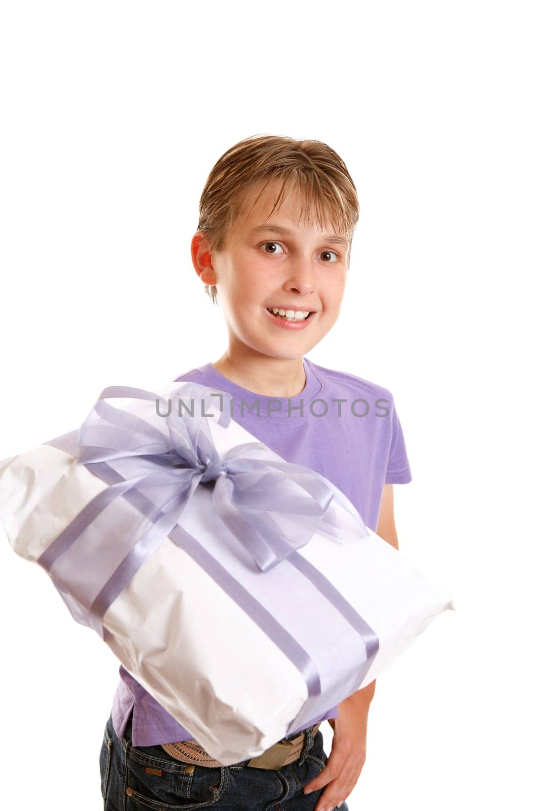 A boy holding a wrapped present