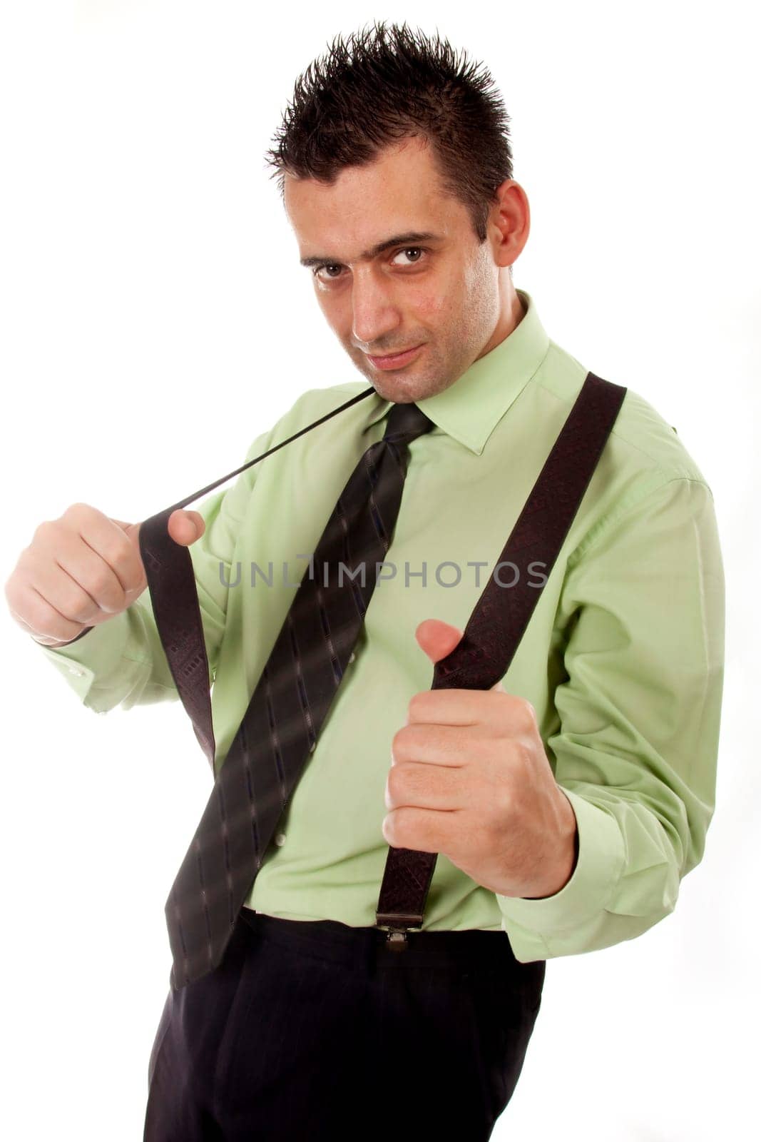 Young handsome man holding his braces