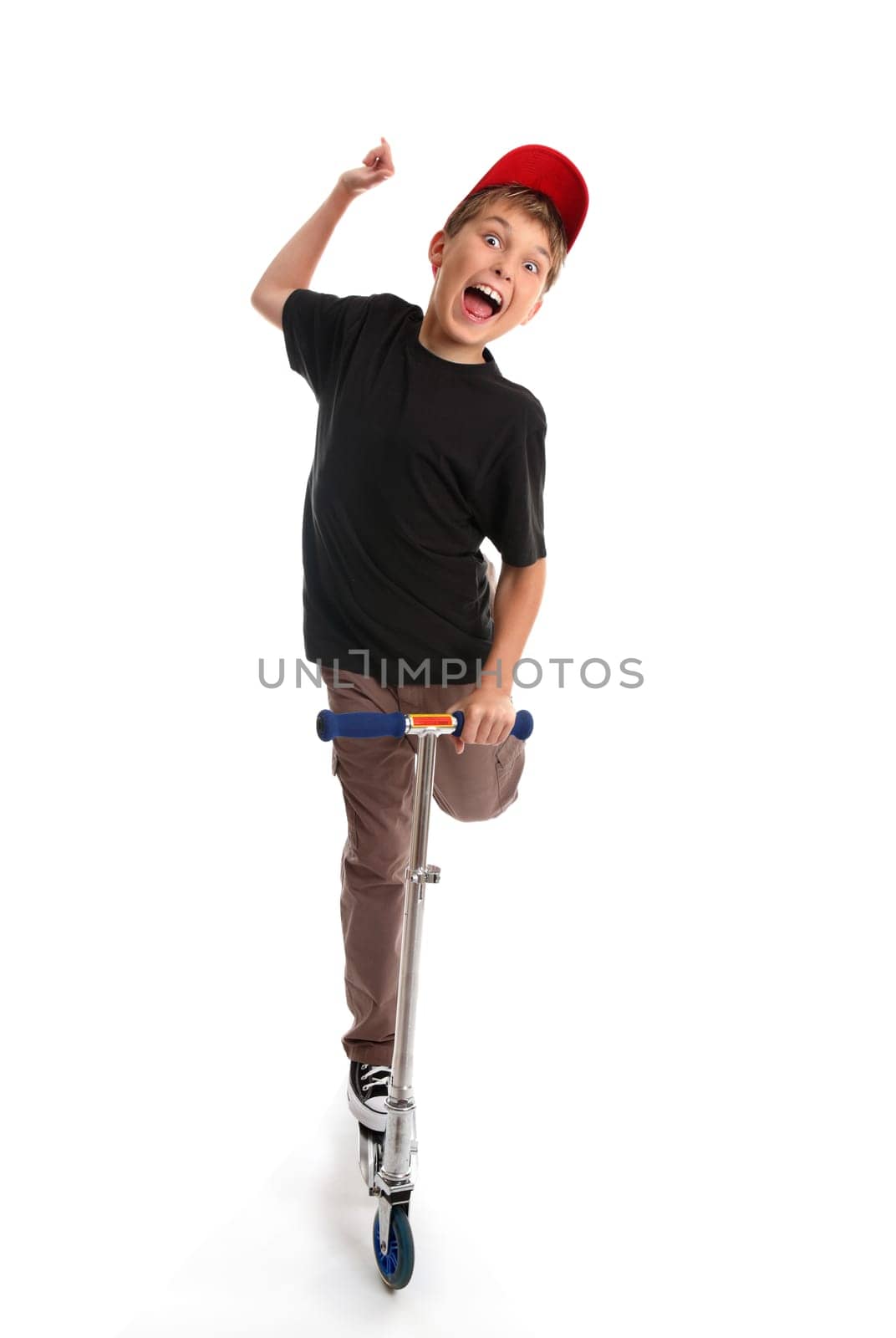 Boy crazy happy fun on a scooter