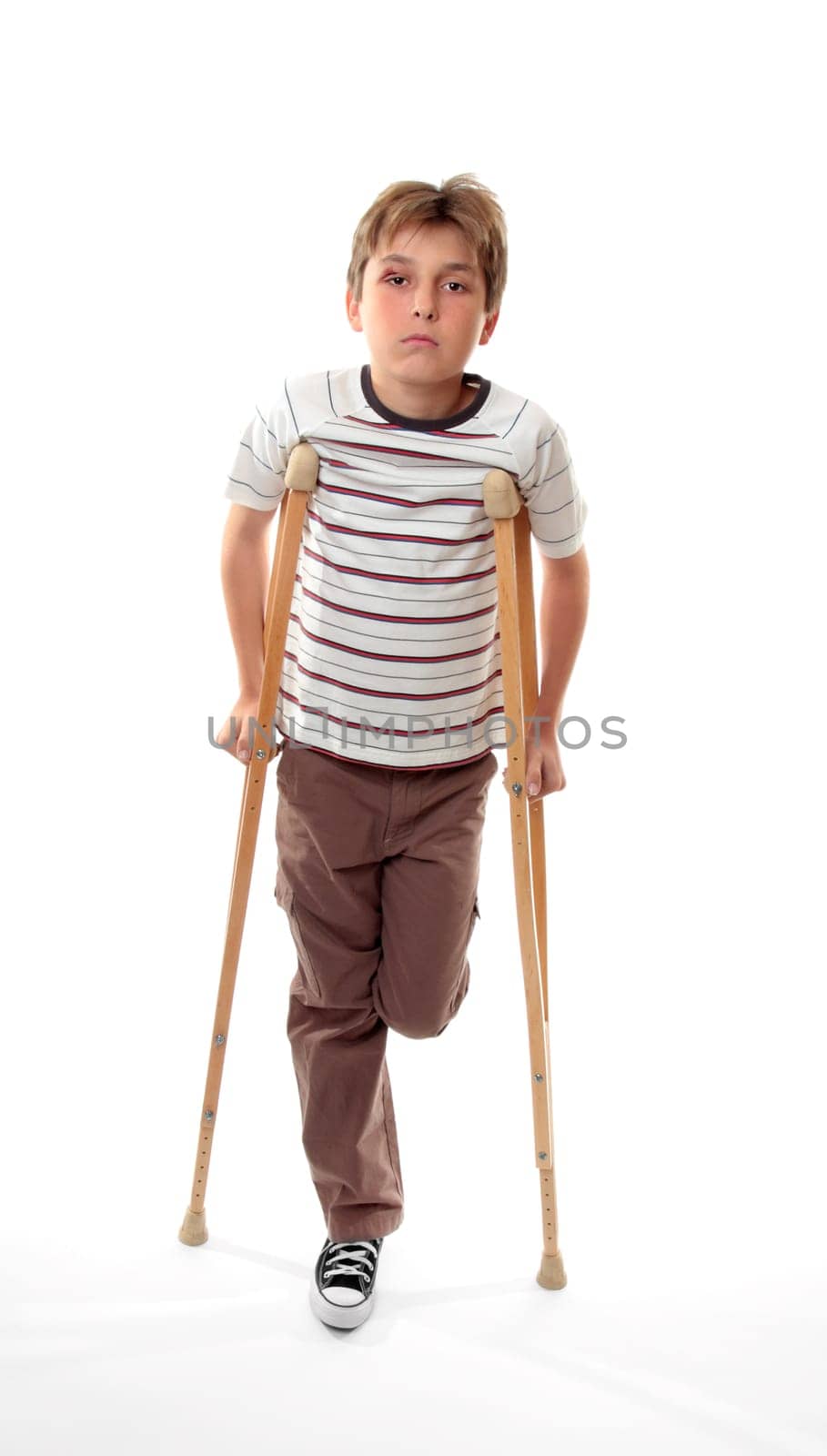 injured boy on crutches