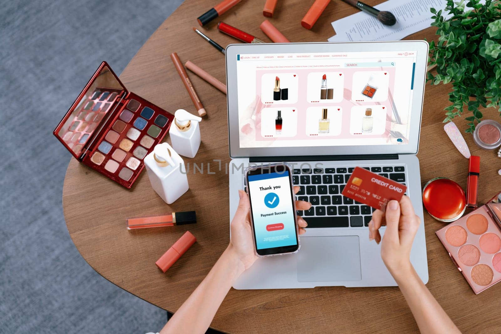 Woman shopping online on internet marketplace browsing for sale items for modern lifestyle and use credit card for online payment from wallet protected by utmost cyber security software