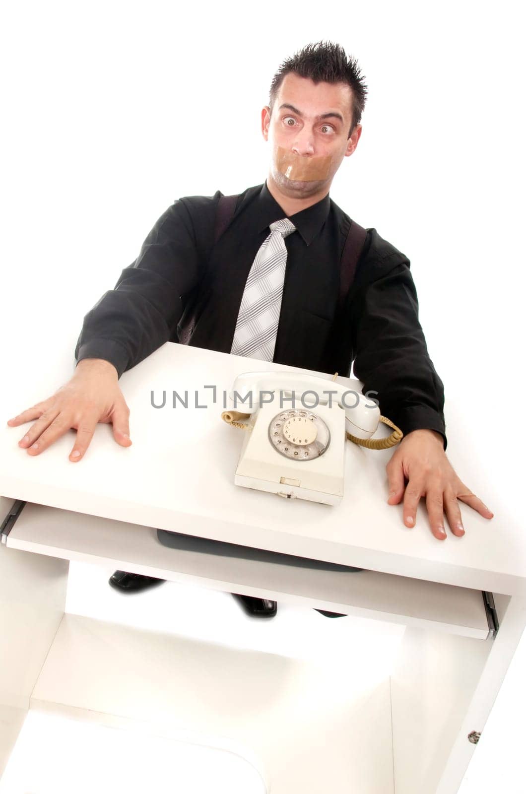 Funny businessman with tape on his mouth