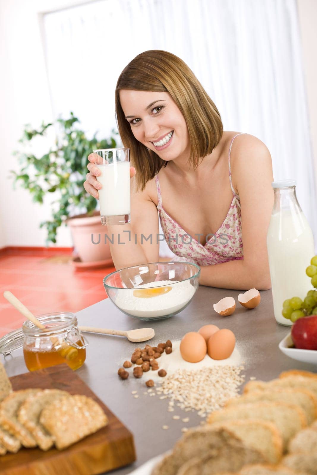 Baking -  woman with healthy ingredient
