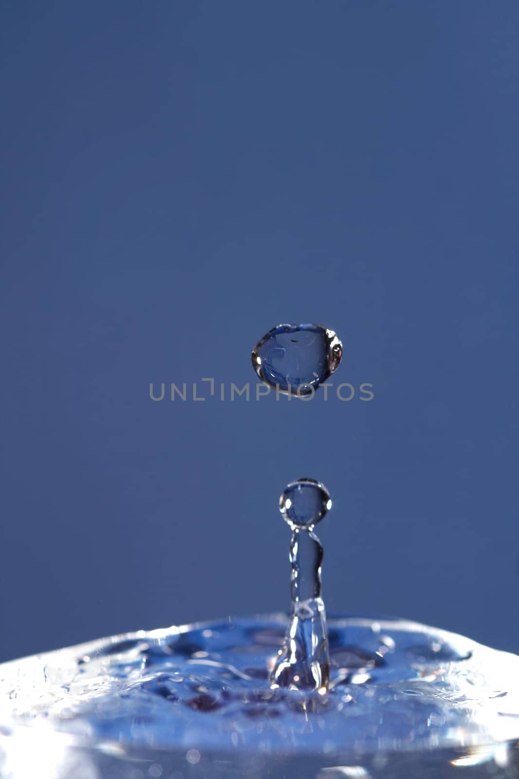 spout and falling drop
