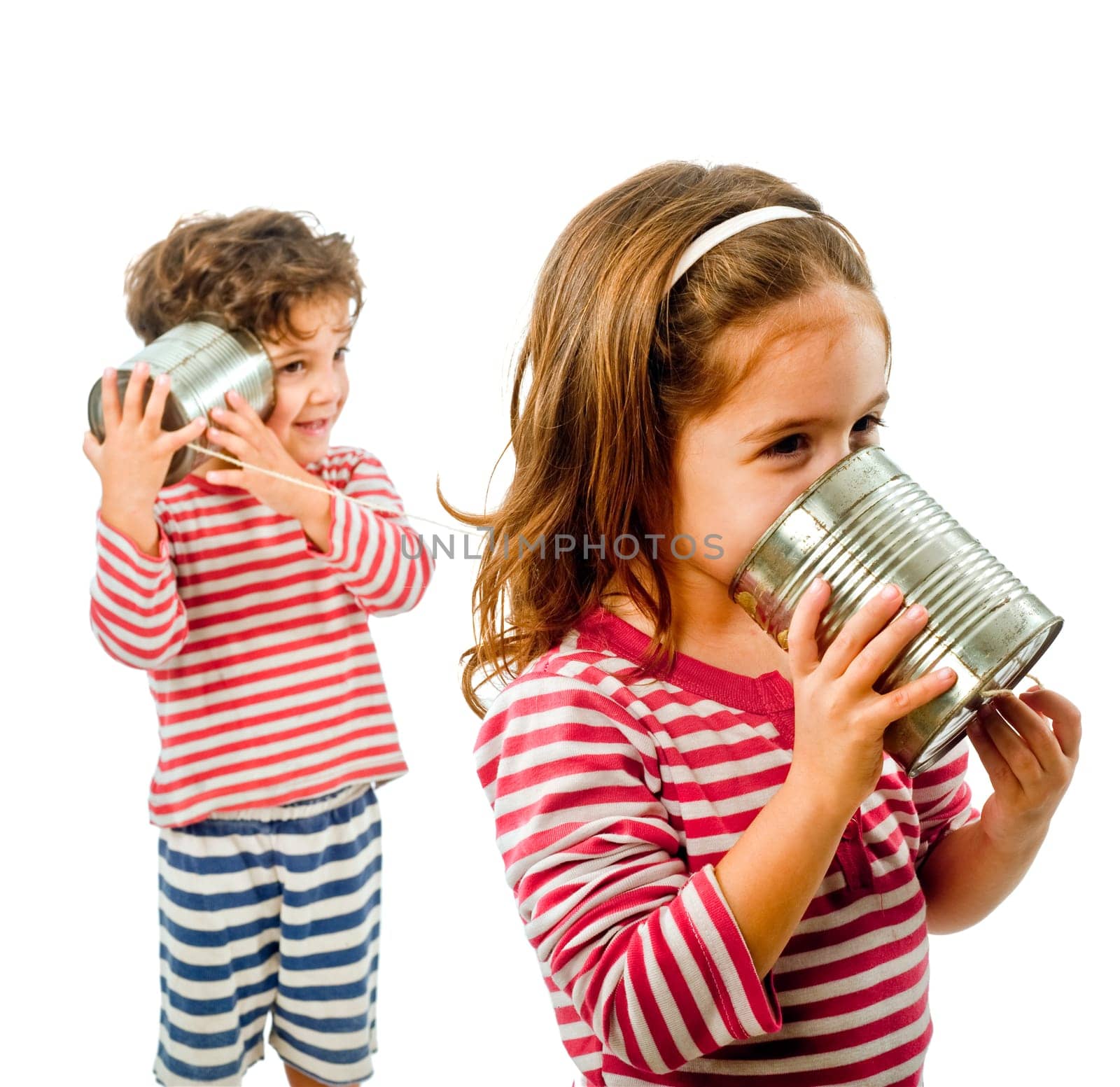 two kids talking on a tin phone