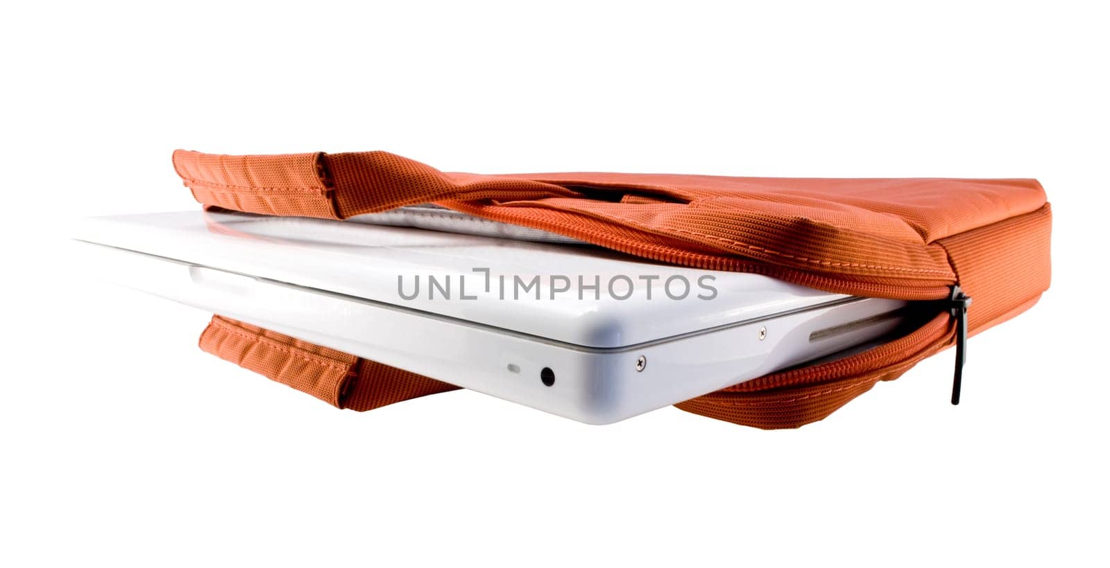 Orange bag and white laptop