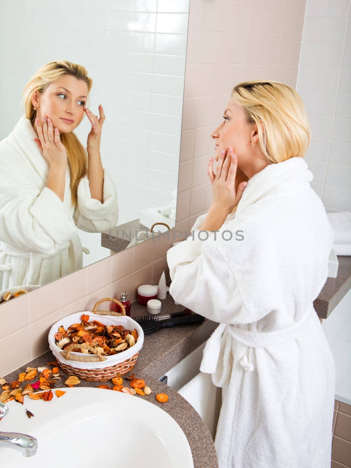 woman looking at computer and laughing