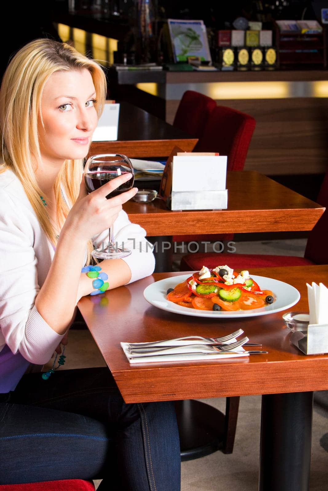 Young Woman Eating Dinner