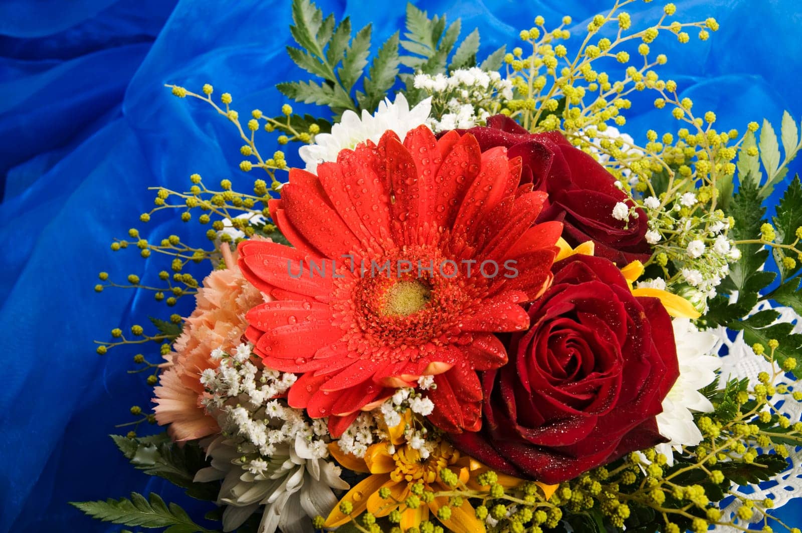 bunch of flowers on blue