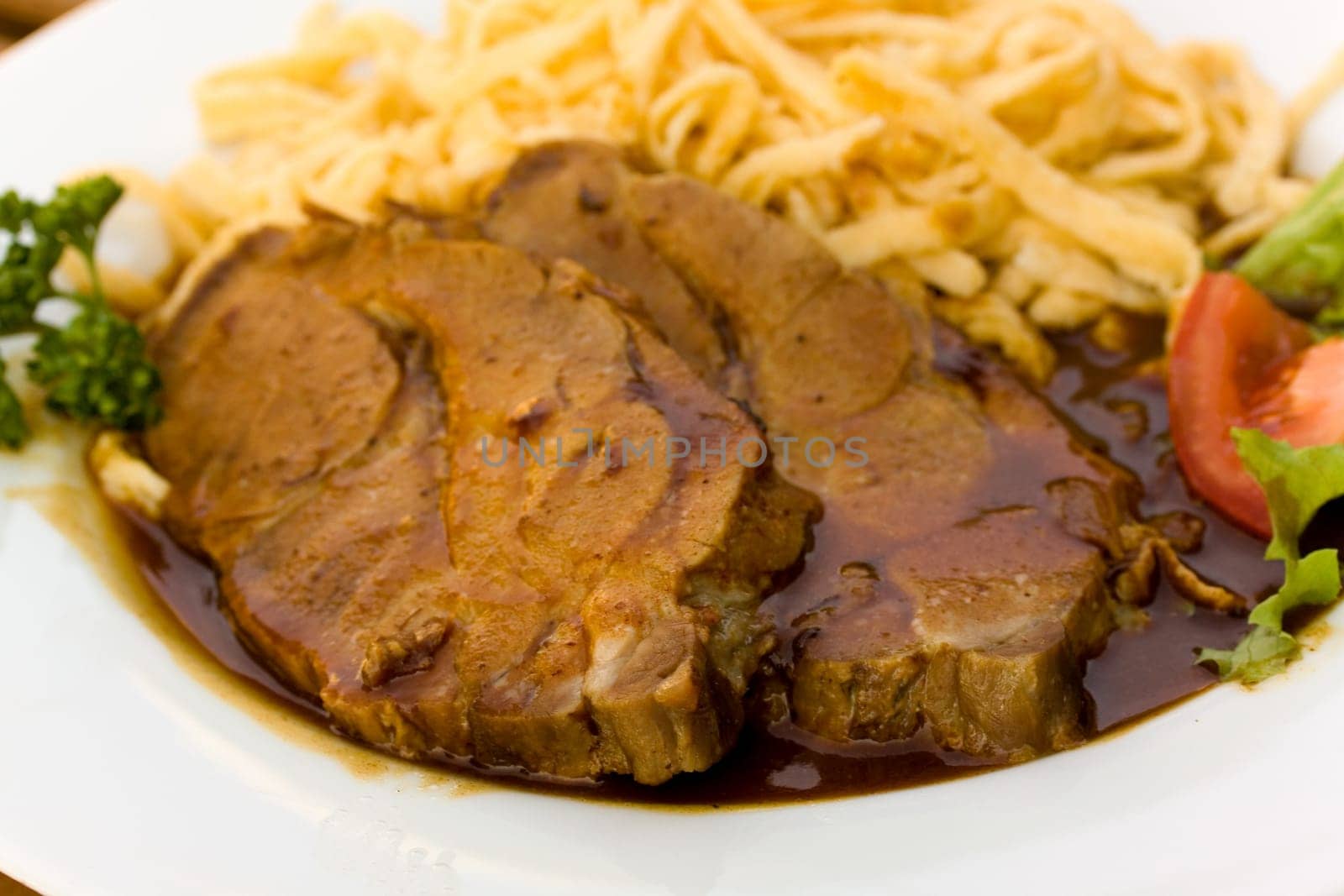 Roast pork with malt sauce and spaetzle