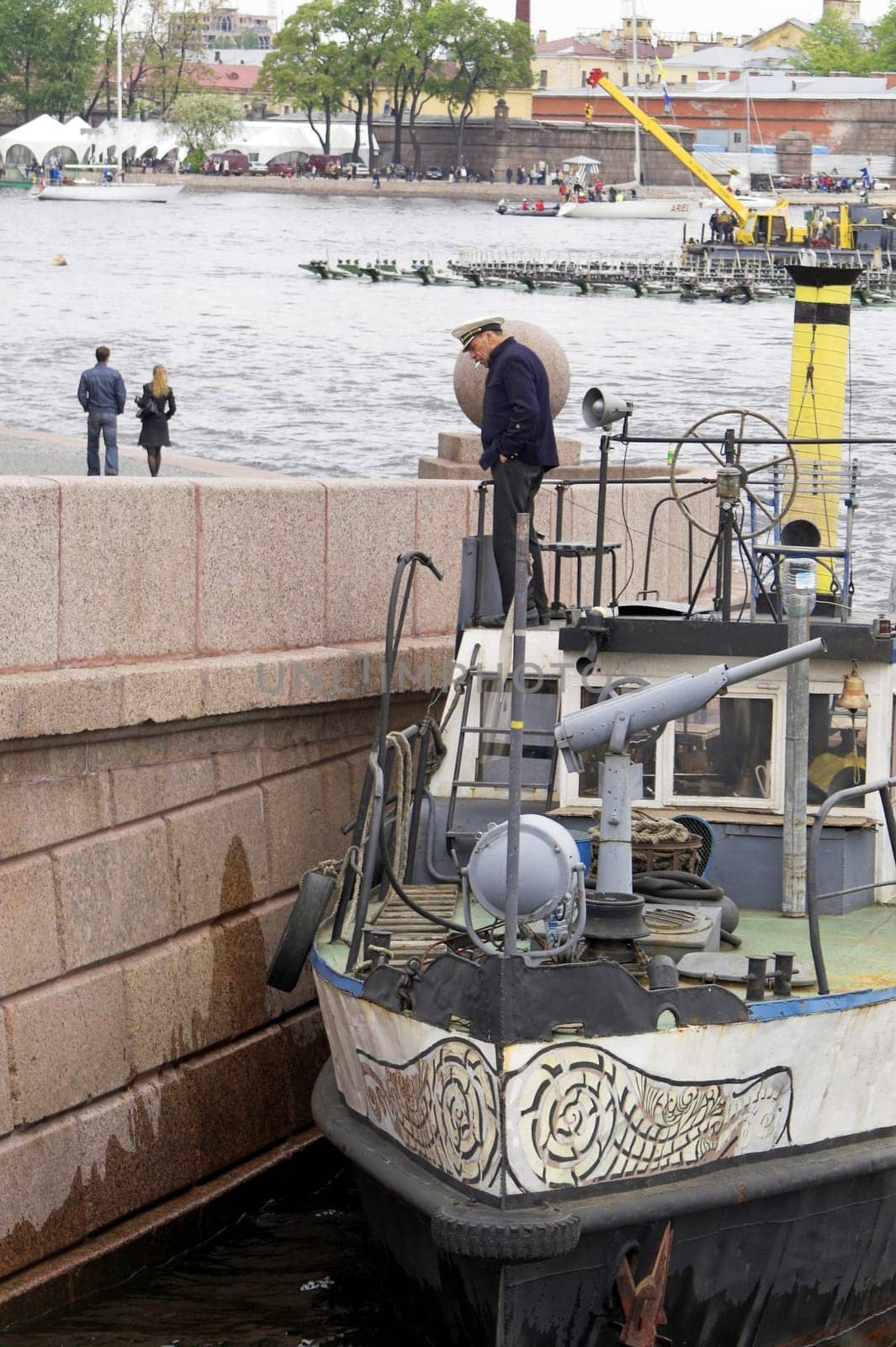 A small vessel at the embankment of Vasili Island in Saint Petersburg, Russia.