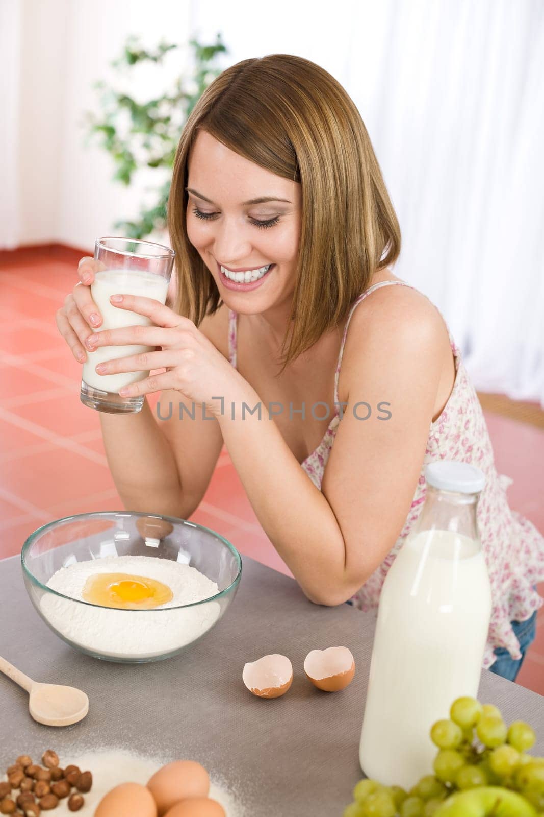 Baking -  woman with healthy ingredient