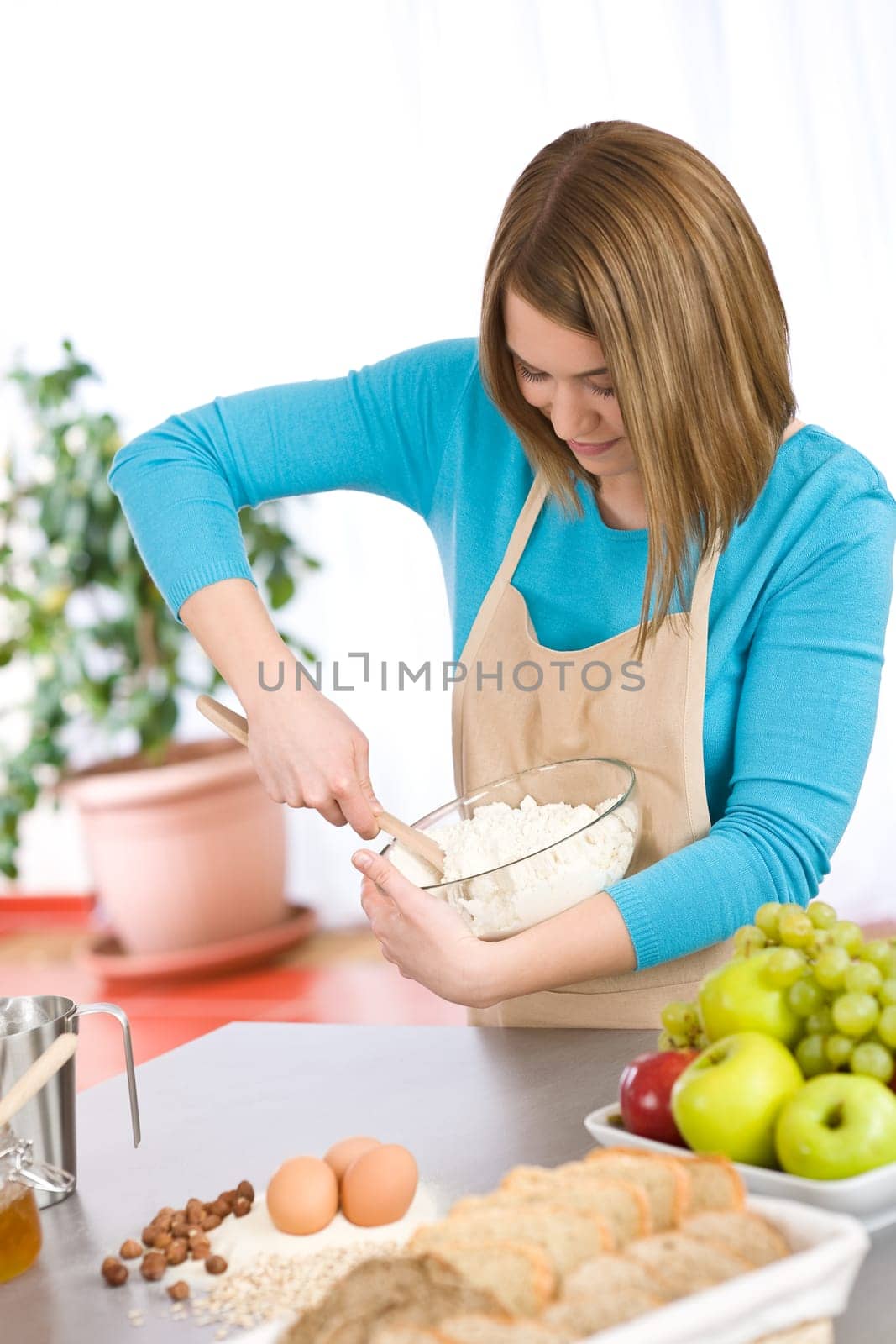 Baking -  woman with healthy ingredient