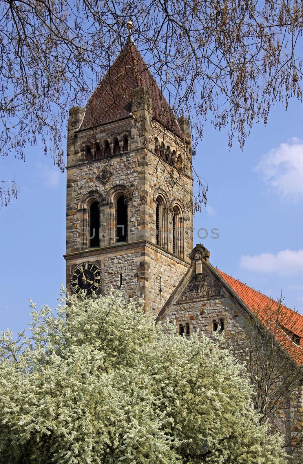 The 48 m high tower of St. Peter's Church,a neo-Romanesque Art Nouveau church in Weinheim (spring 2010)
