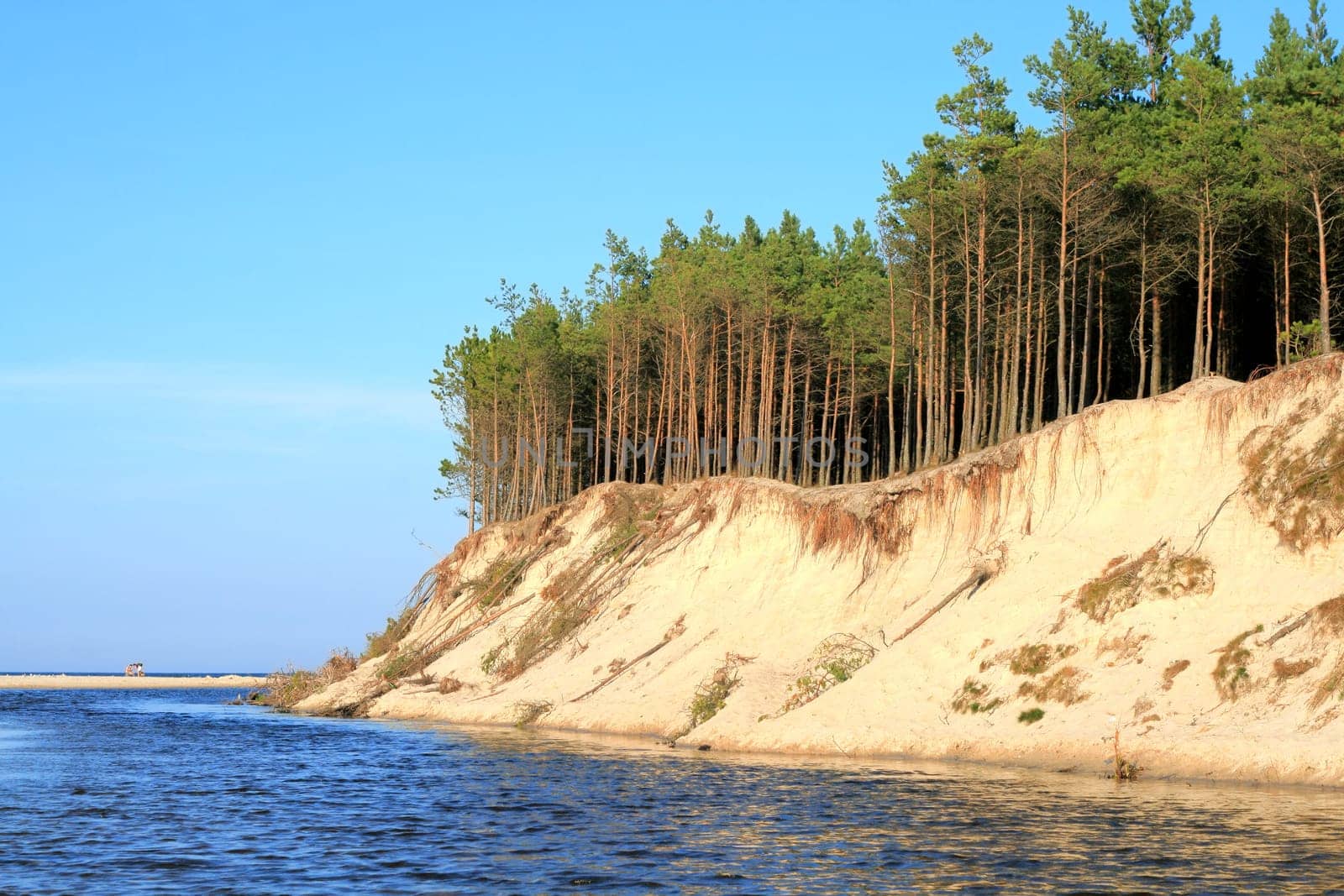 River and a cliff on the seashore
