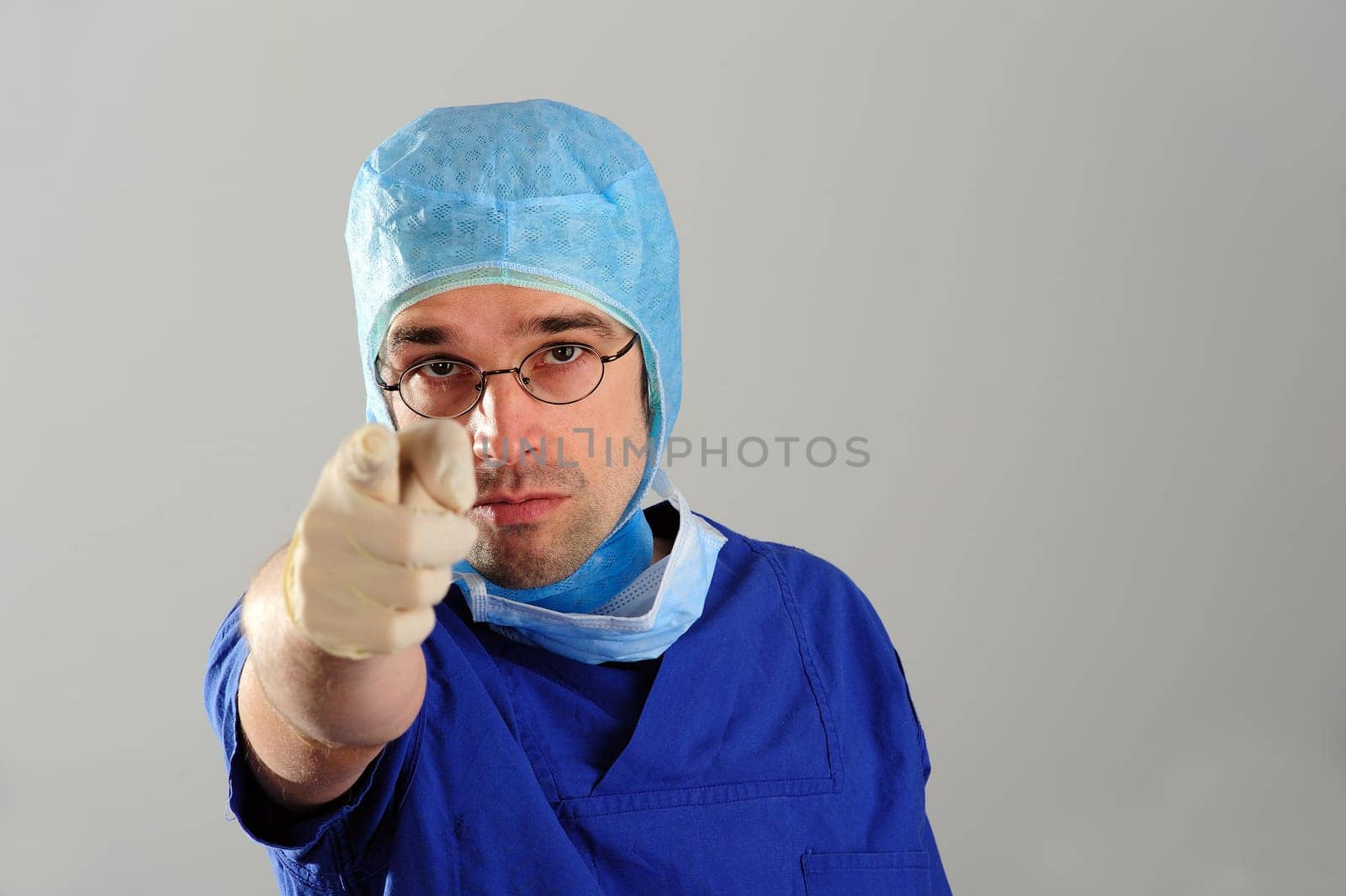doctor with forefinger up