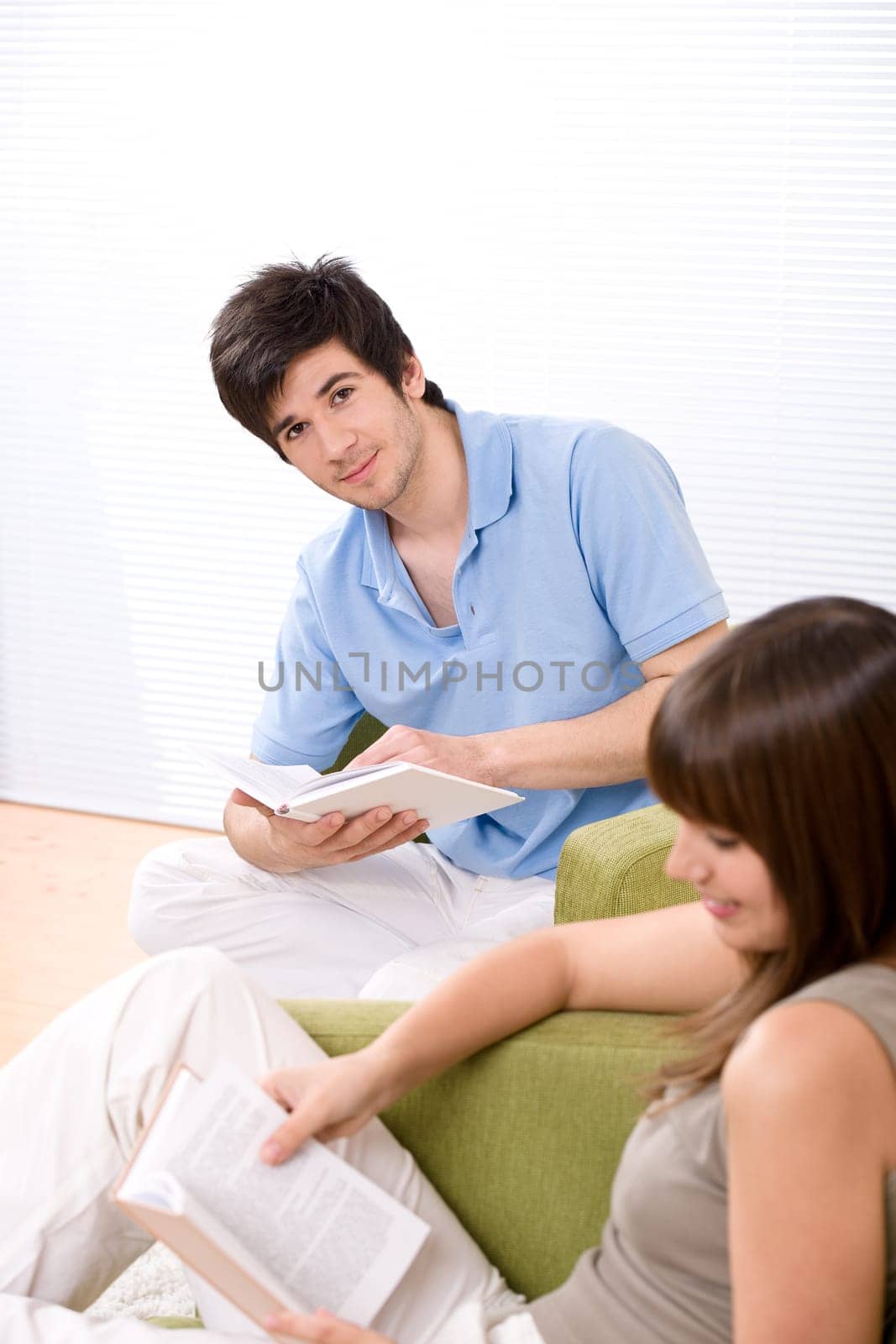 Student - two teenager reading book home