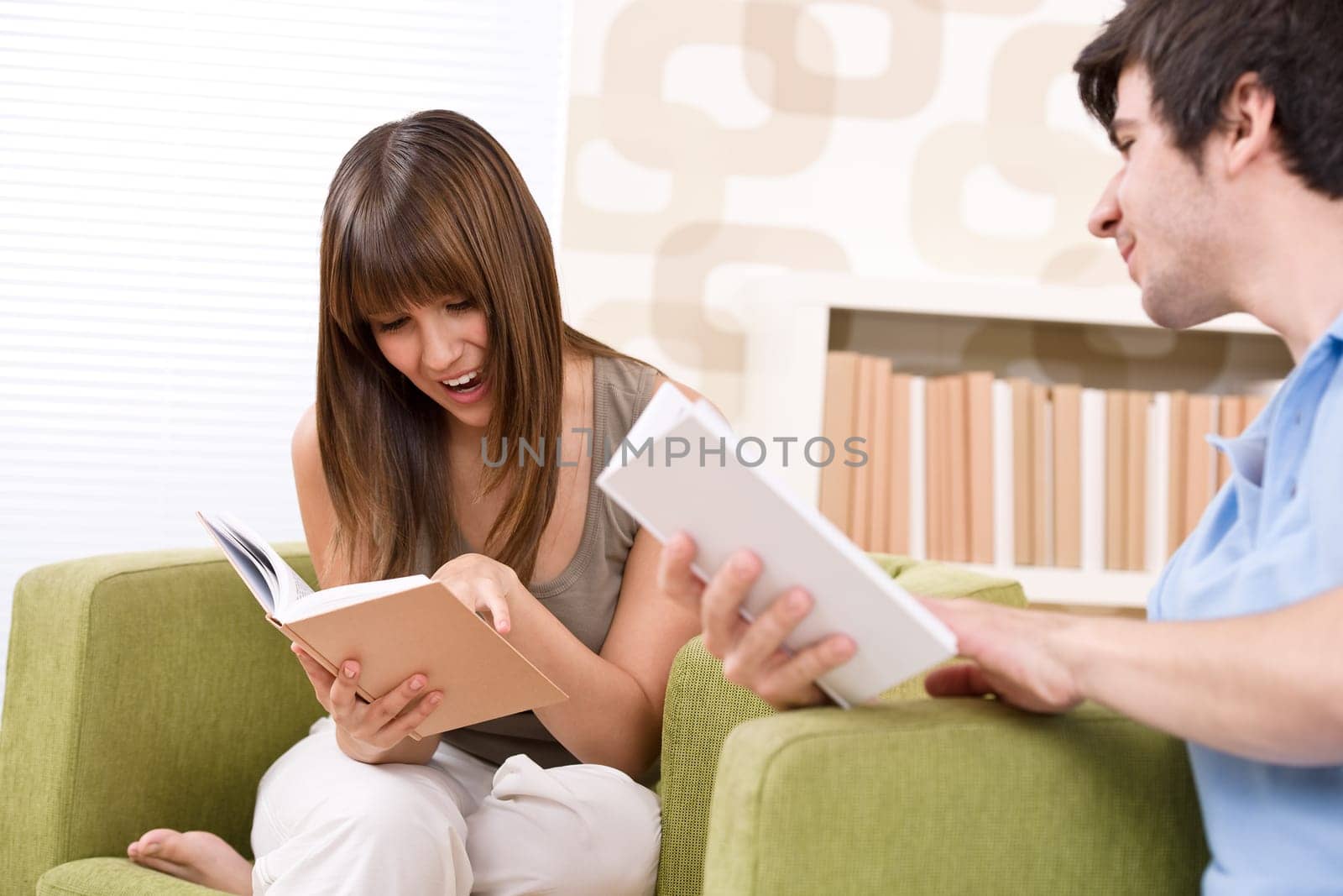 Student - two teenager reading book home