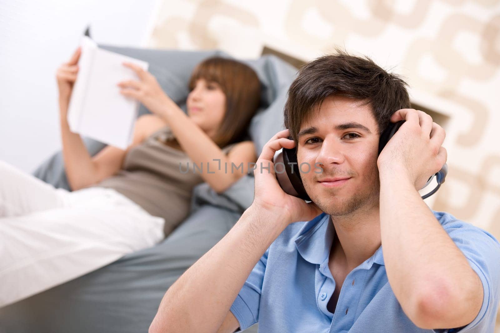 Student - Teenager man relaxing with headphones