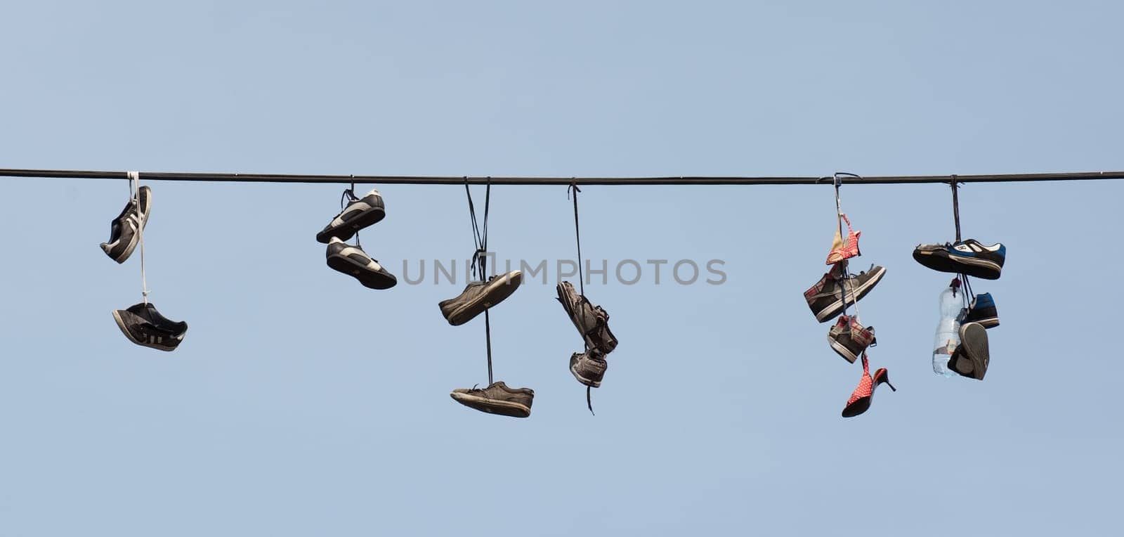 Shoes on the power line