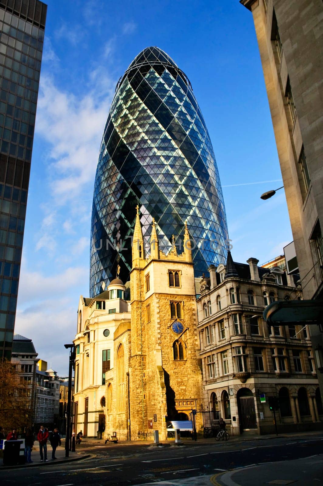 Gherkin building and church of St. Andrew Undershaft in London