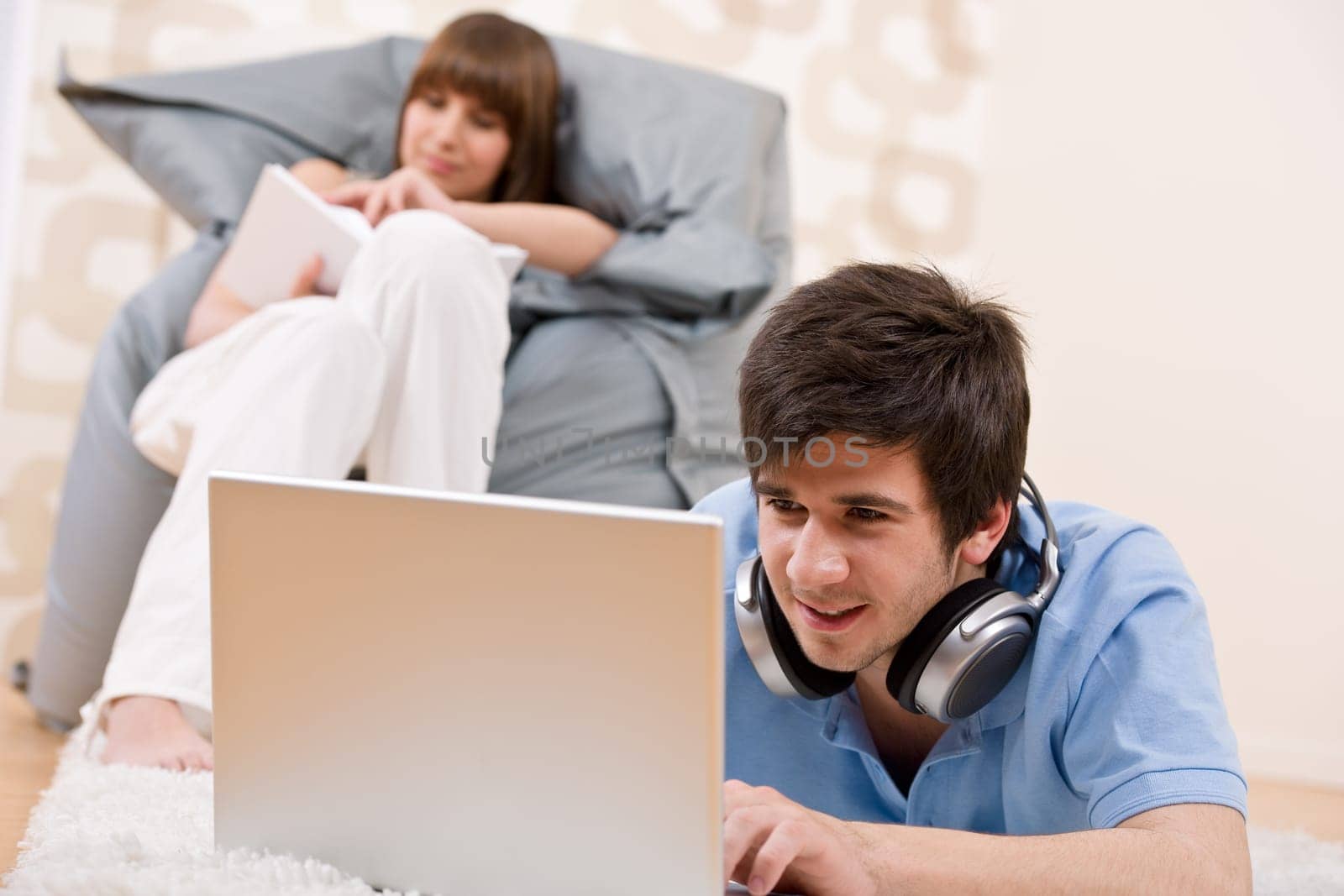 Student - Two teenager with laptop and headphones