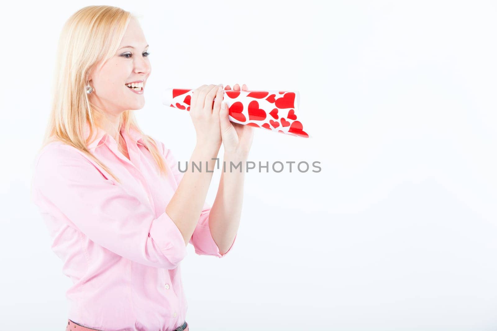young blond woman with big valentine post card