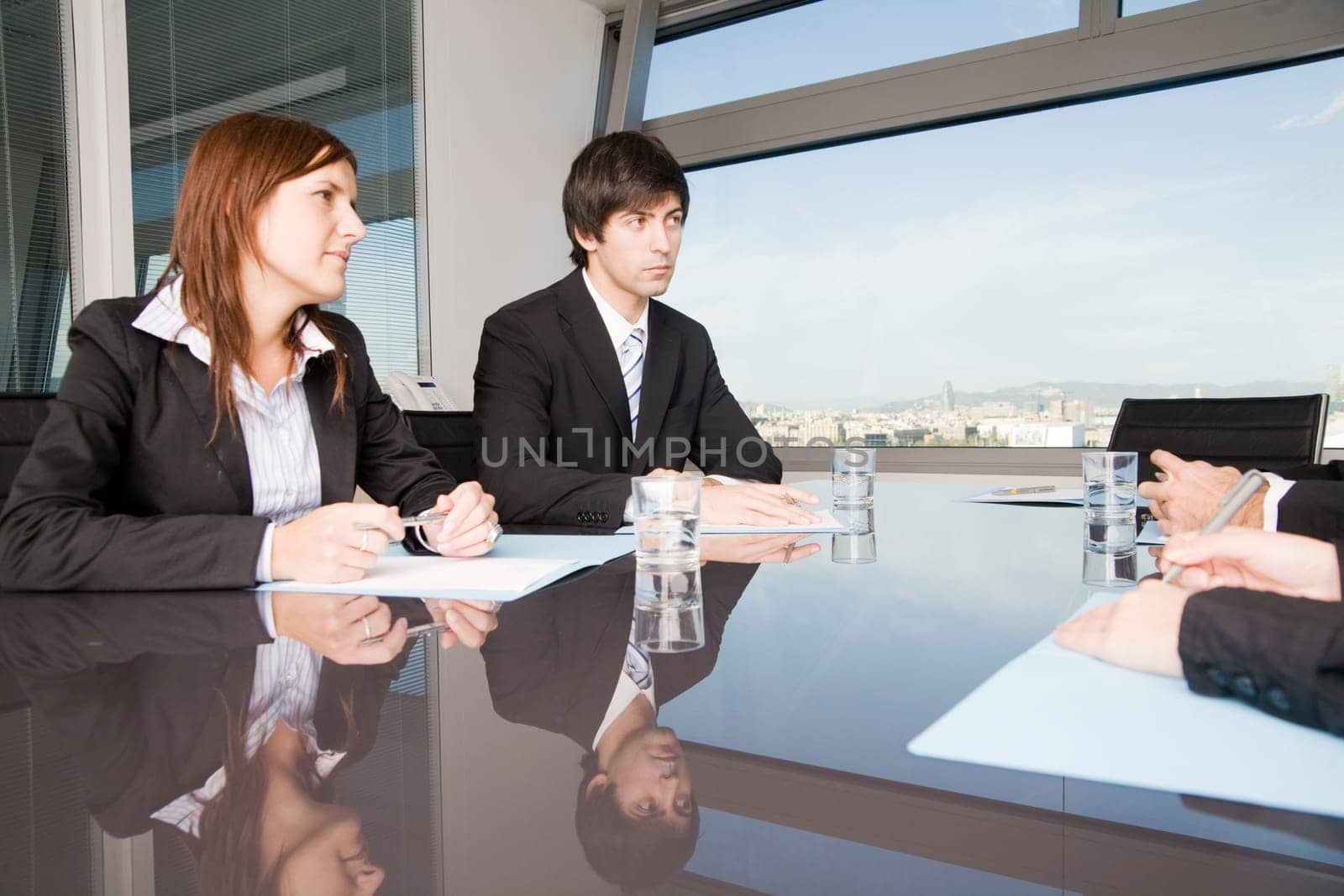 Businessman with assistant laughing
