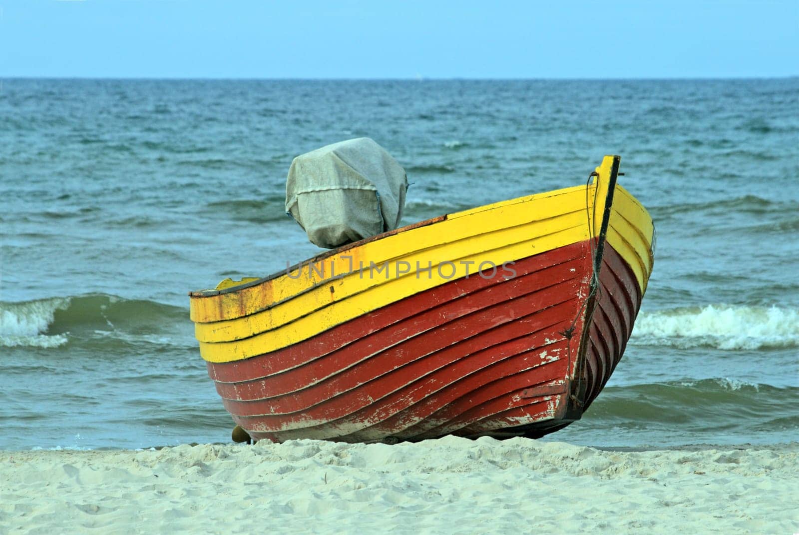 Wooden boat on the seashore