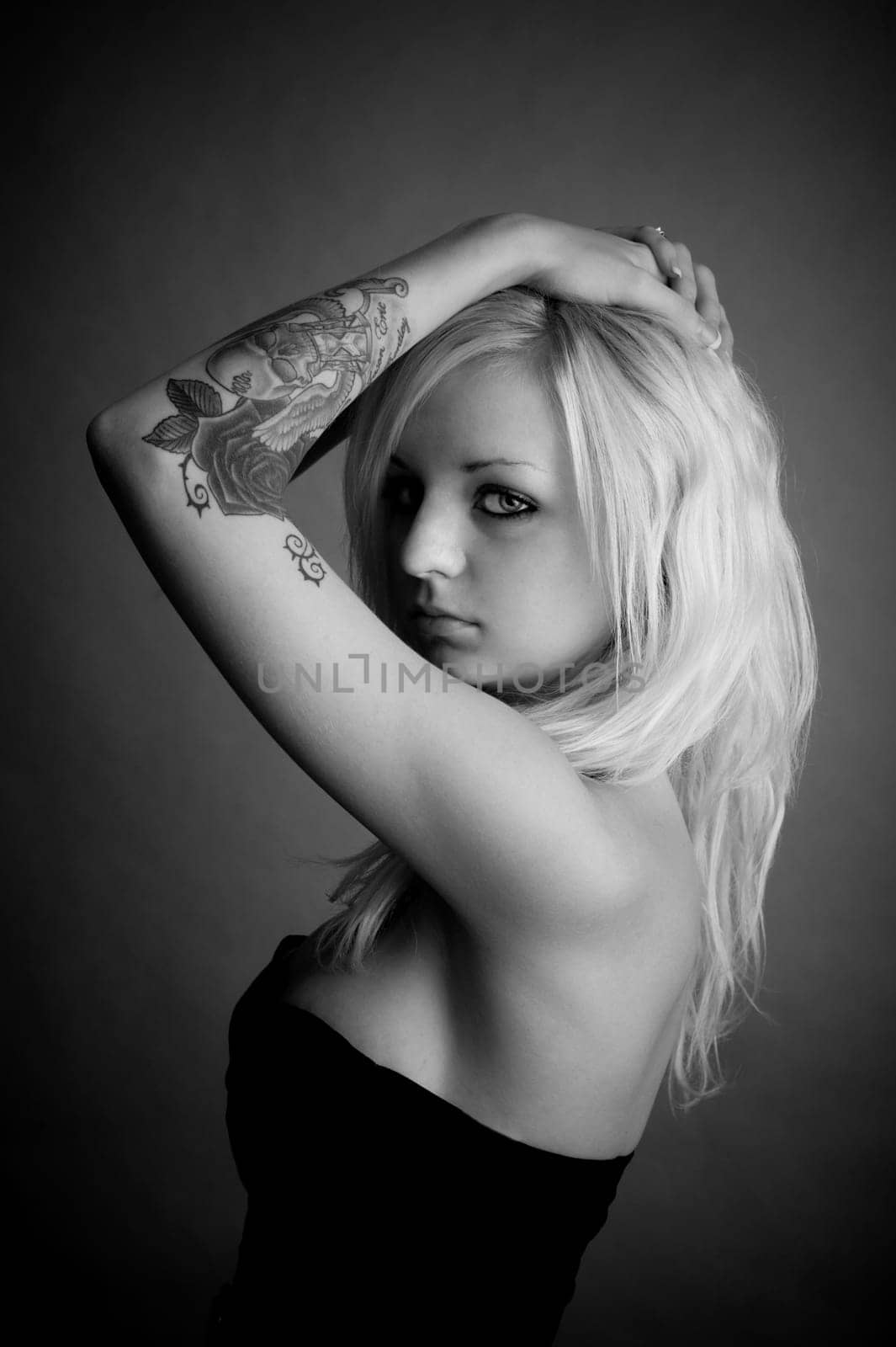 Beautiful Girl With Hands on Head