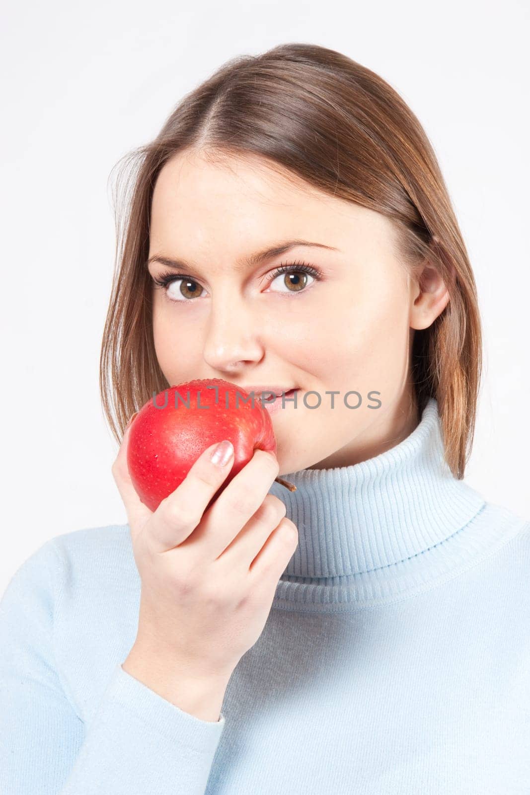 woman with red grapes