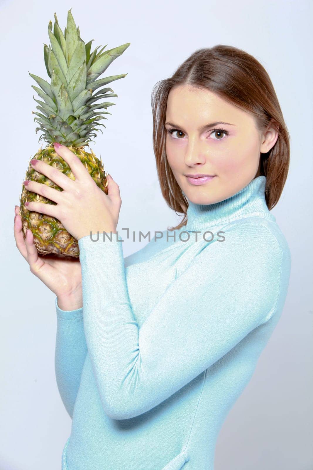 woman with red grapes