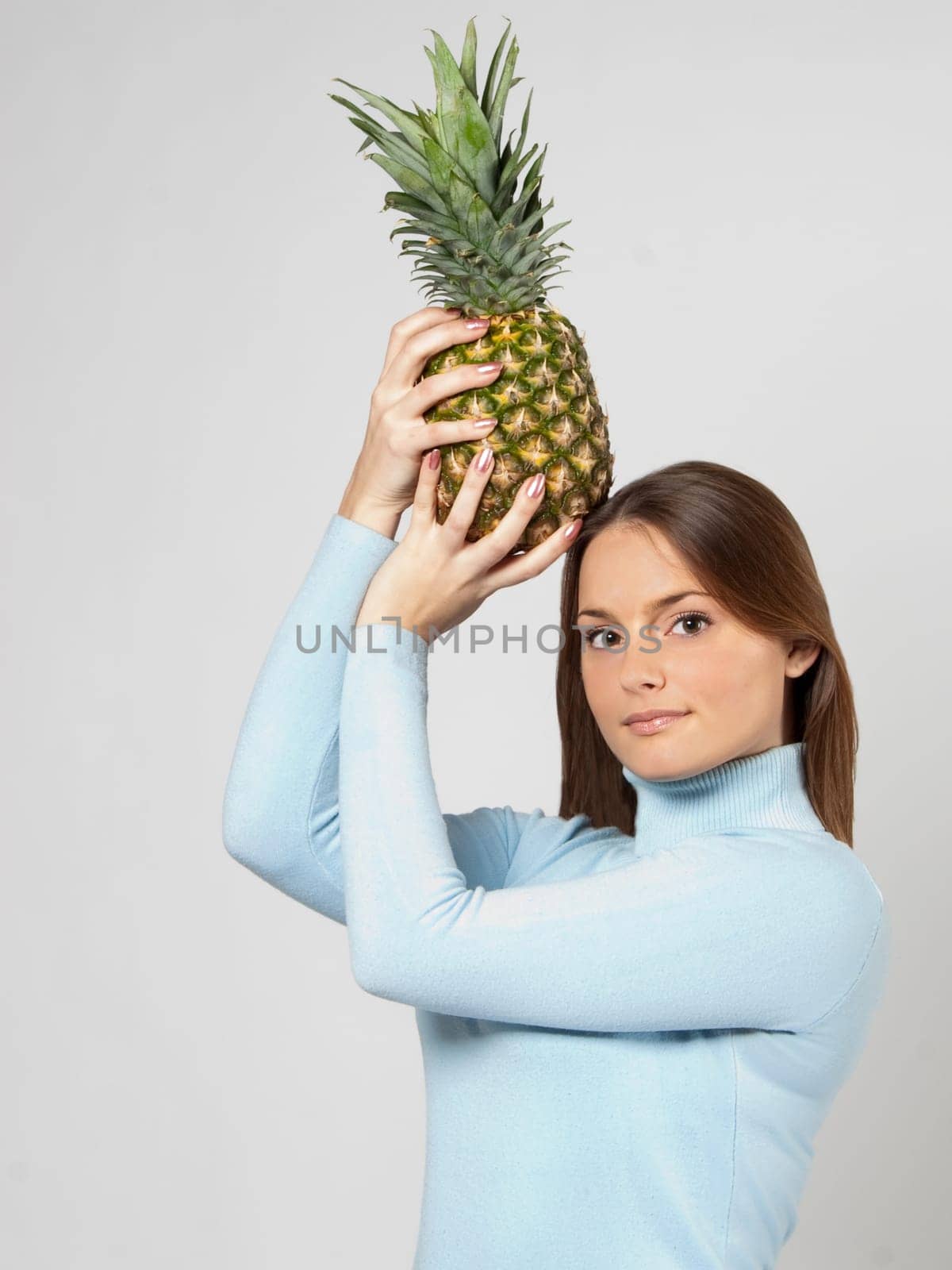 woman with red grapes