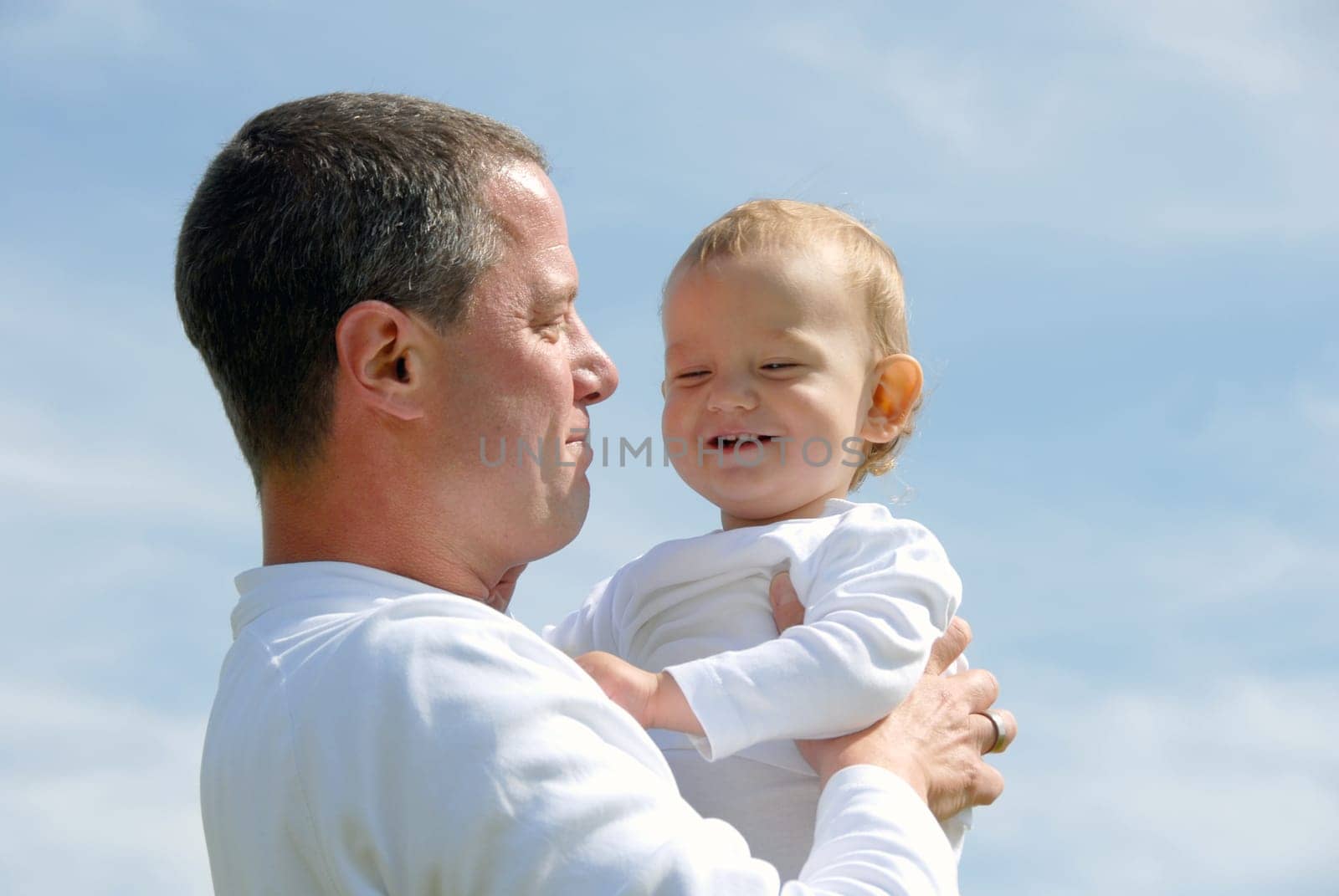 Proud Father -Holding Child-