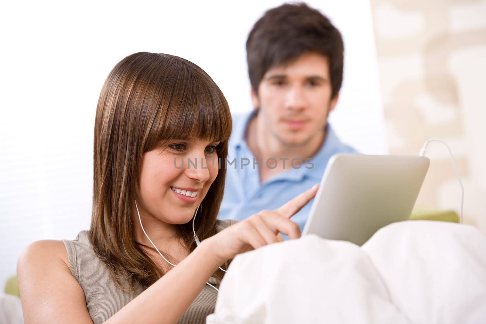 Student - teenage woman with touch screen tablet computer