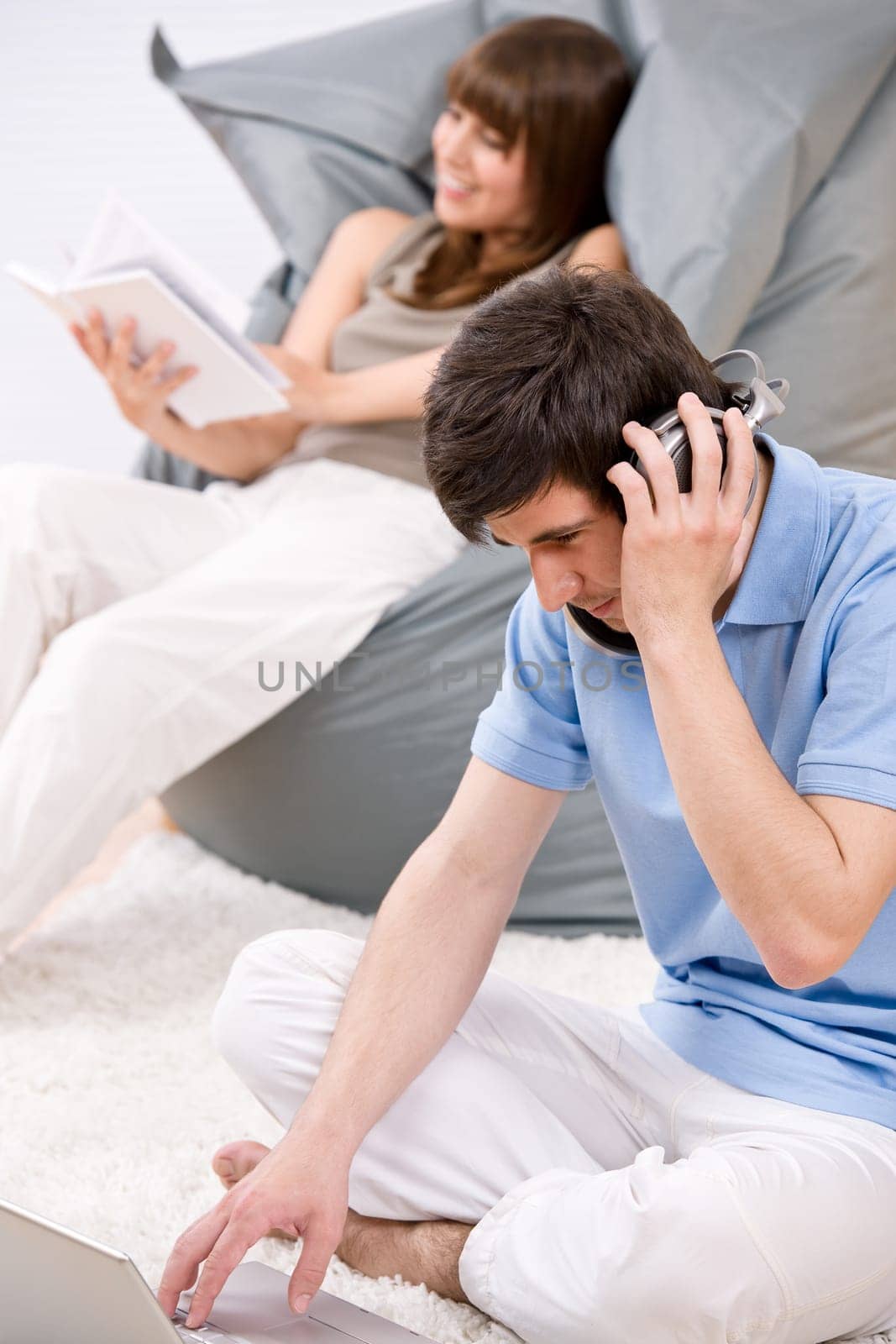 Student - Two teenager with laptop and headphones