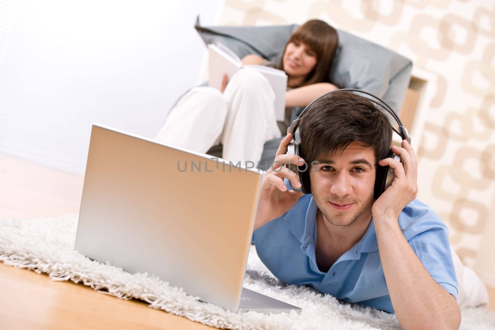 Student - Two teenager with laptop and headphones