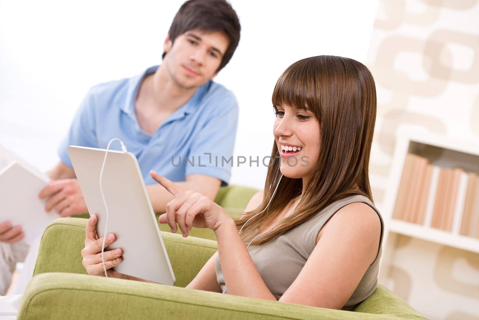 Student - teenage woman with touch screen tablet computer