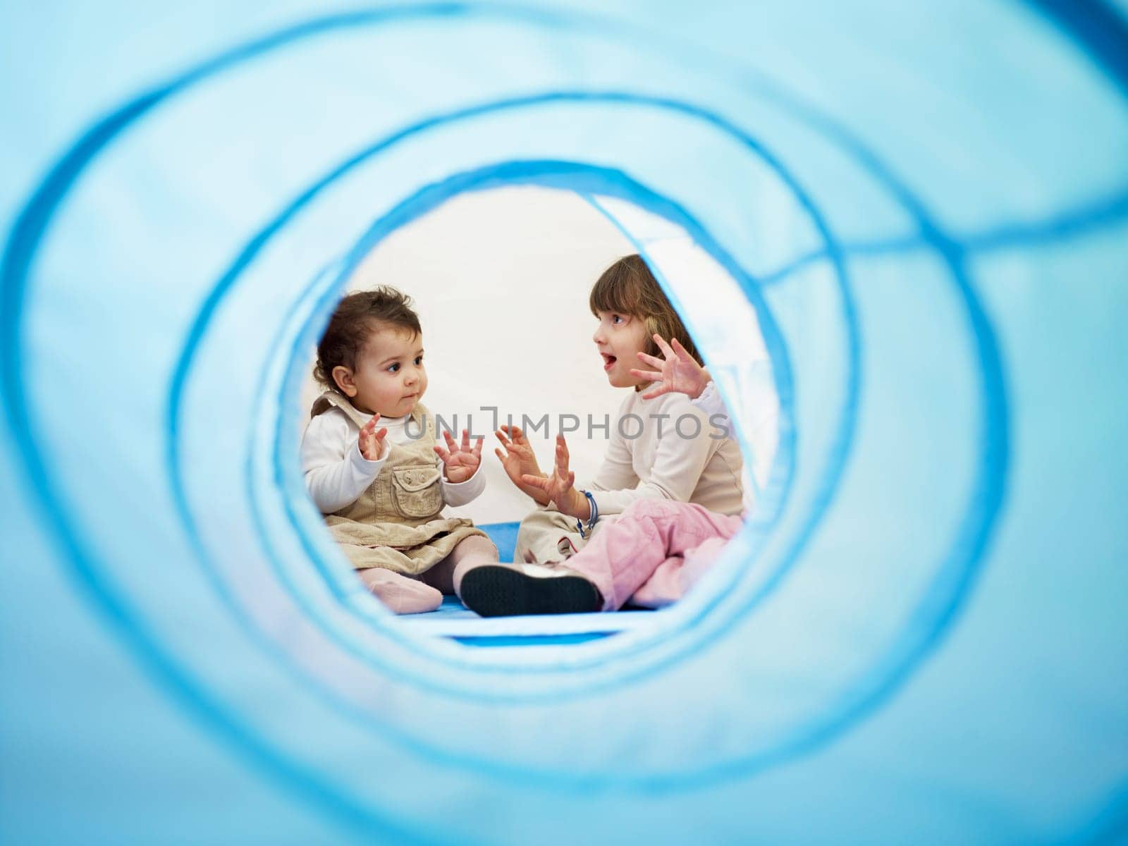 three little girls and female teacher in