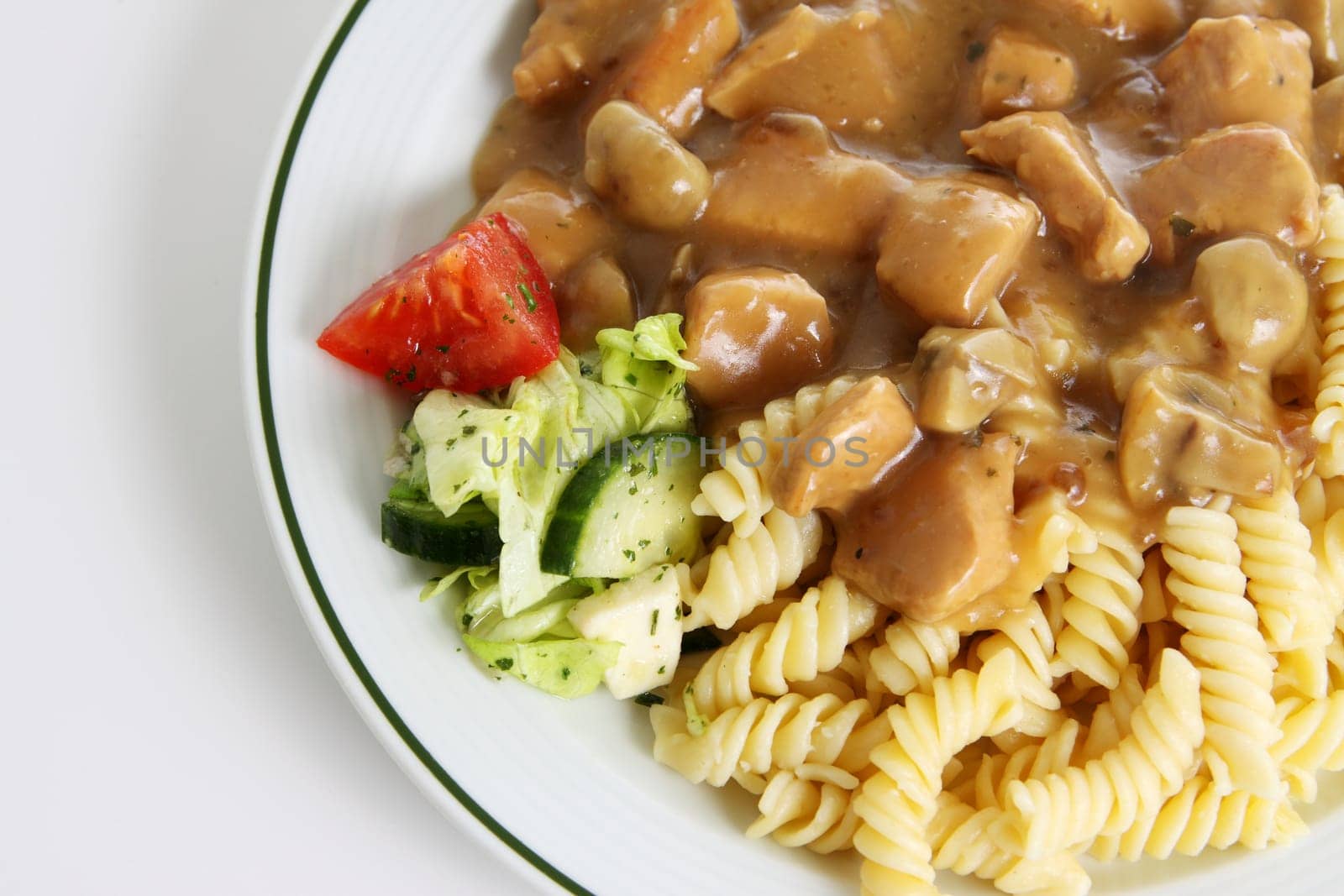 Goulash with noodles and side salad
