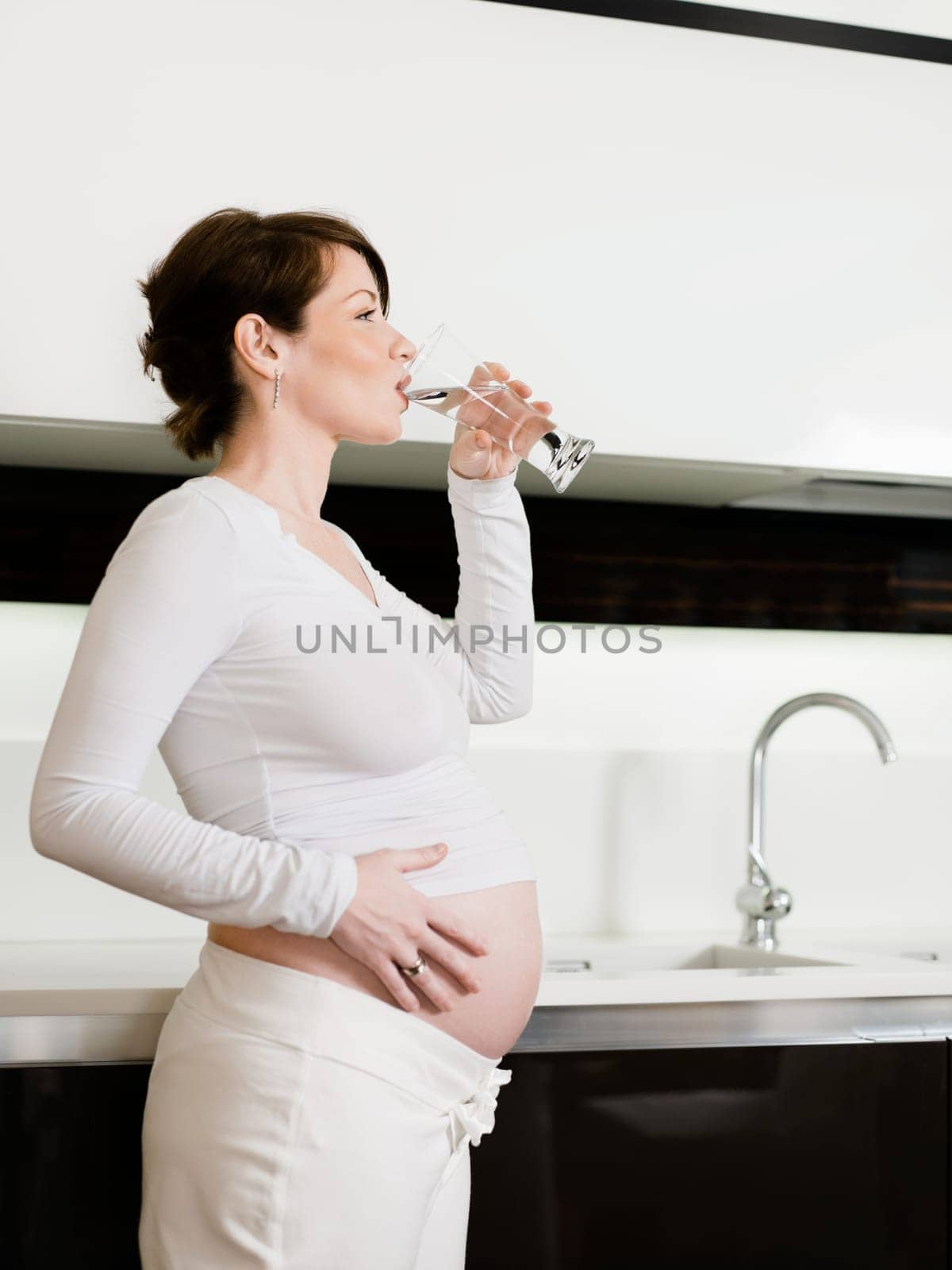 pregnant woman drinking water