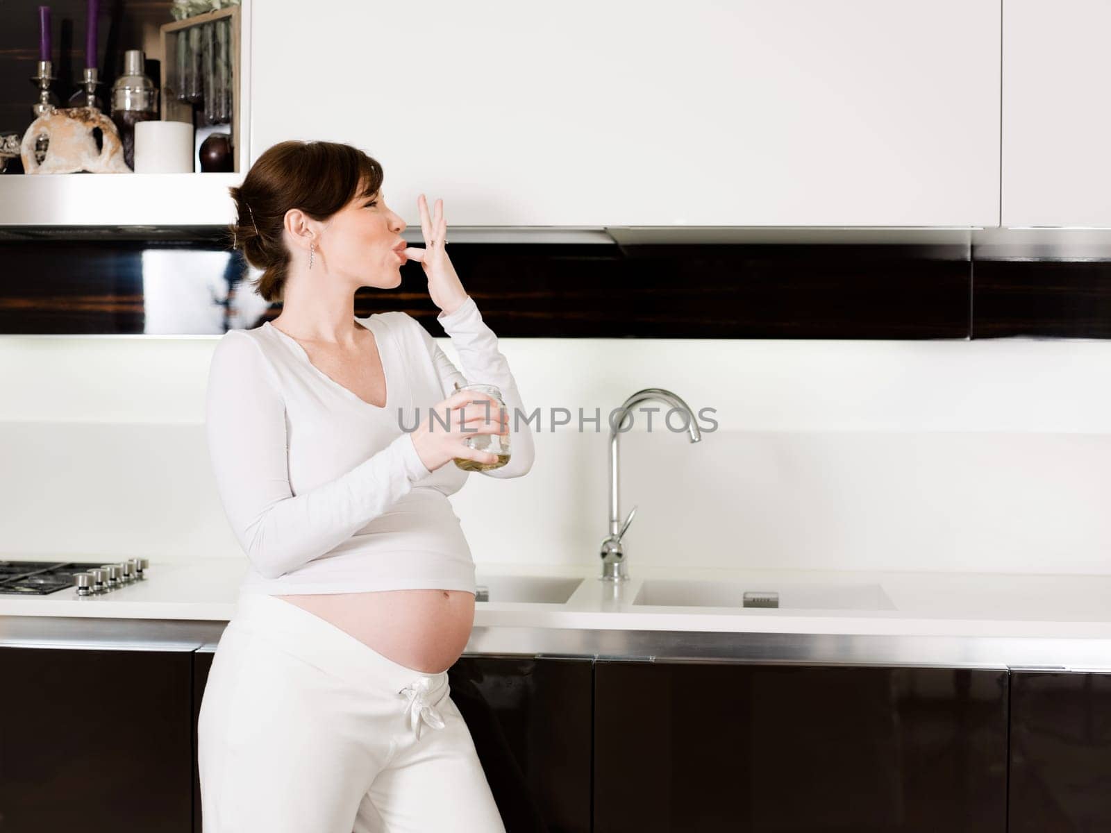pregnant woman drinking water