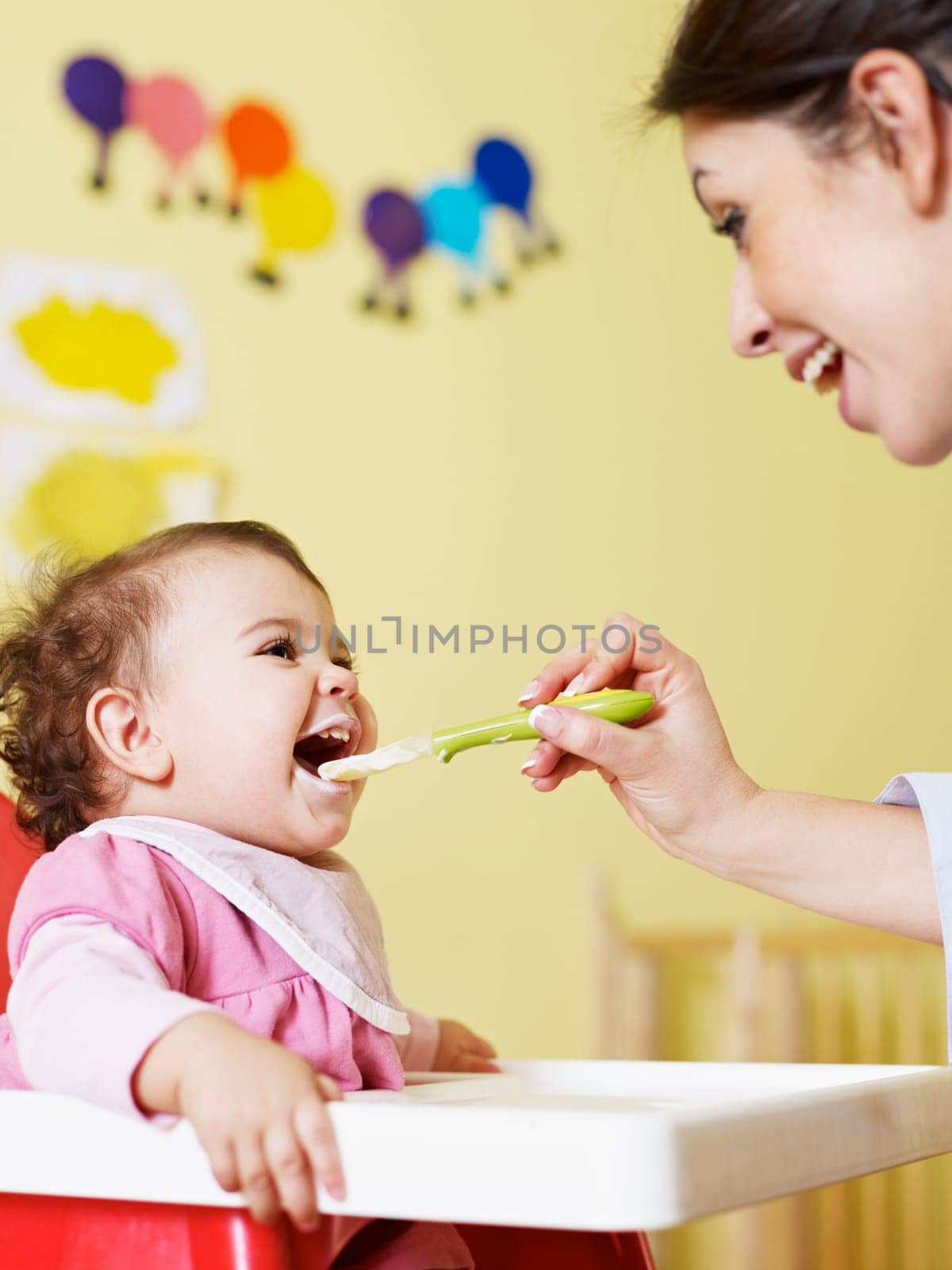 three little girls and female teacher in